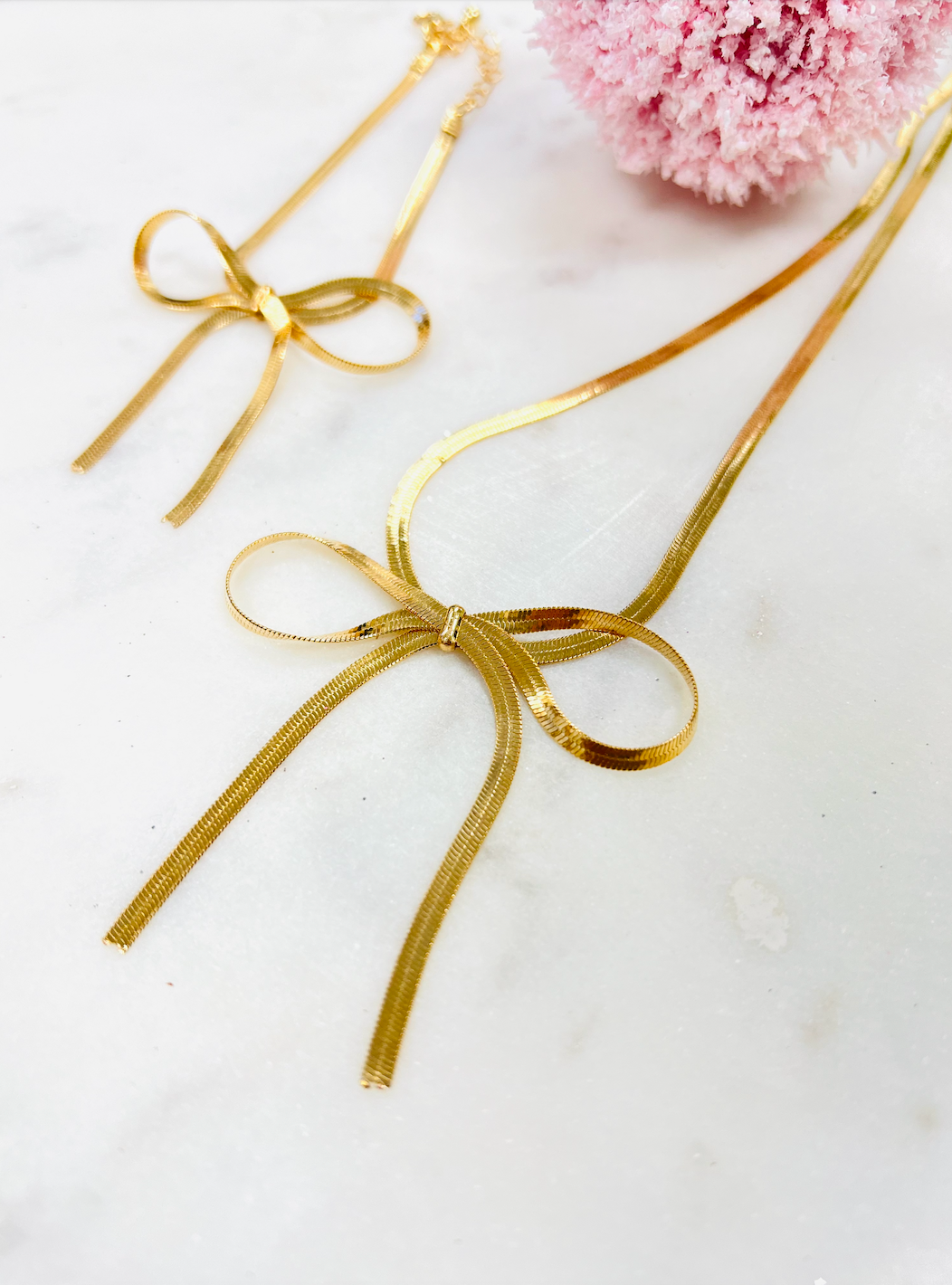 GOLD BOW NECKLACE