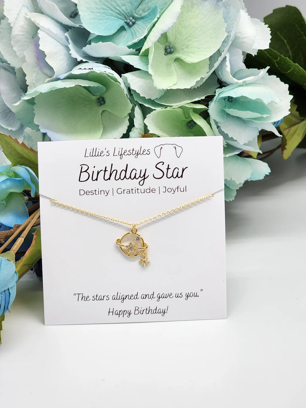 BIRTHDAY STAR NECKLACE