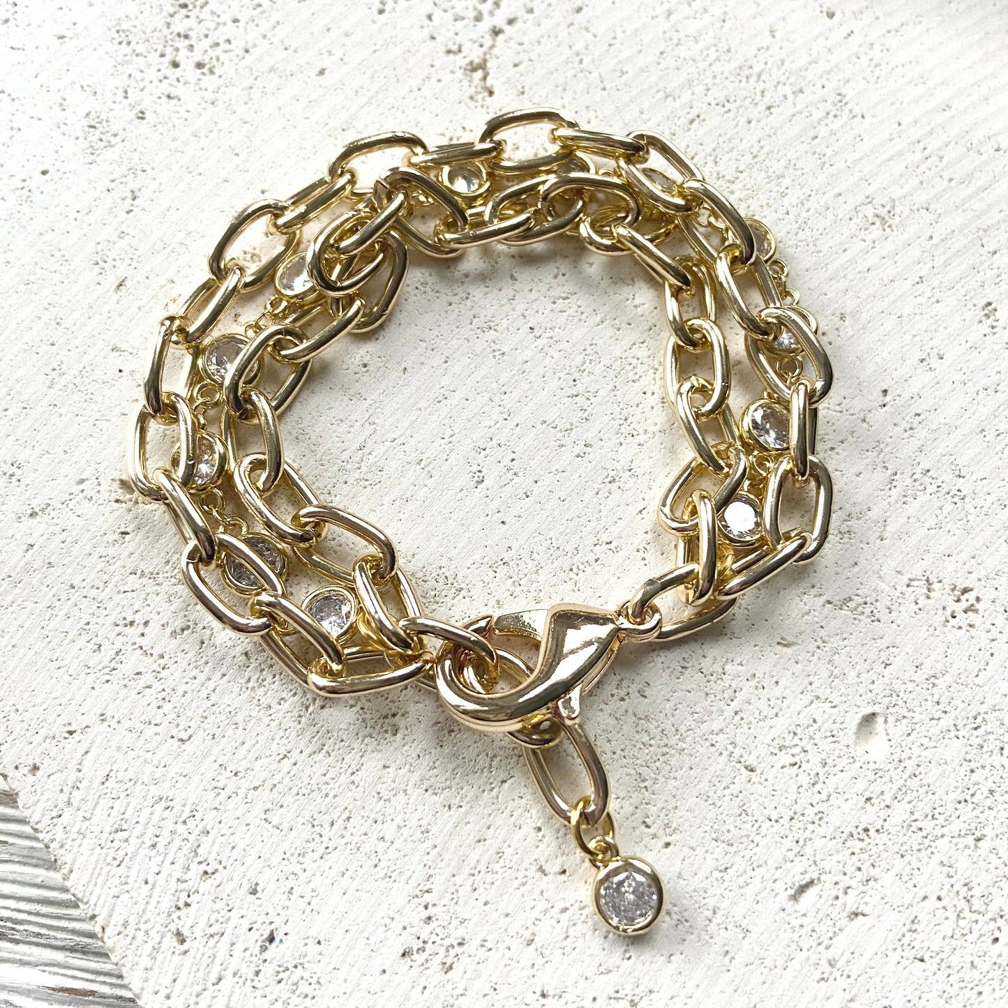 BOUTIQUE THREE STRAND CRYSTAL/GOLD BRACELET