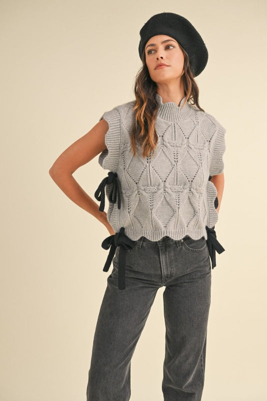 SCALLOPED KNIT VEST WITH SIDE BOWS